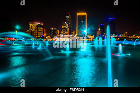 The Friendship Fountains and view of the skyline at night in Jacksonville, Florida. Stock Photo