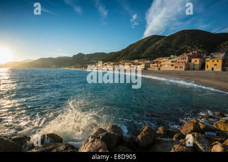 Typical houses on the beach in the evening light, Varigotti, Finale Ligure, Riviera di Ponente, Liguria, Italy Stock Photo