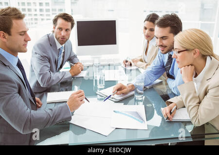 Business people in board room meeting Stock Photo