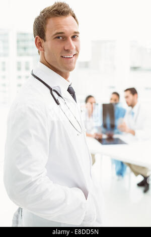 Portrait of a smiling confident male doctor Stock Photo