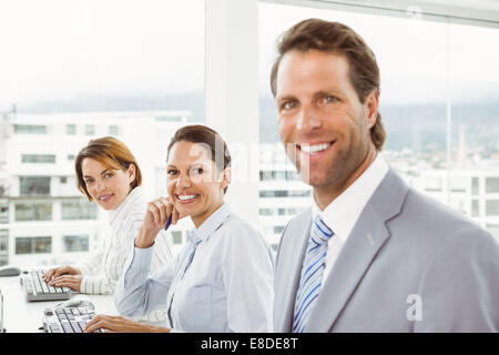 Business people using computers in office Stock Photo