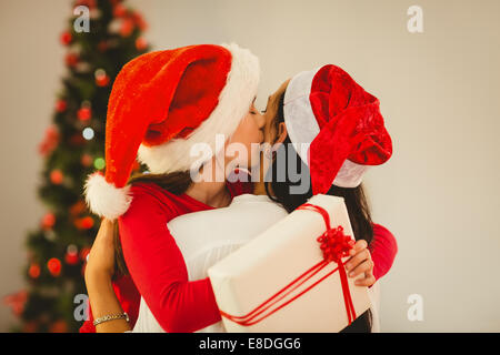 Cute Mother Daughter Hugging Christmas Gifts Next Christmas Tree Home Stock  Photo by ©Vyshnova 625860714