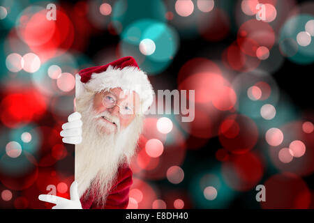 Composite image of santa claus showing Stock Photo