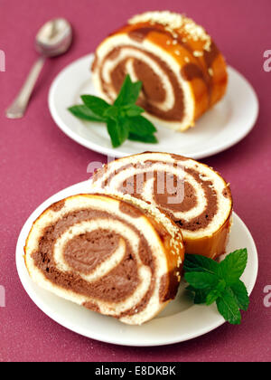 Chocolate swiss roll. Recipe available. Stock Photo