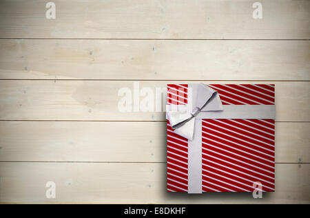 Composite image of christmas present with bow Stock Photo