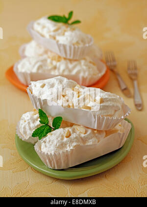Meringues with almonds. Recipe available. Stock Photo