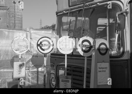 Old temporary Bus stop signs Stock Photo