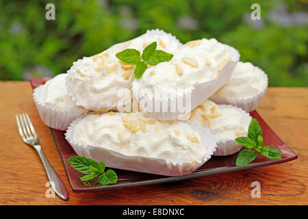 Meringues with almonds. Recipe available. Stock Photo