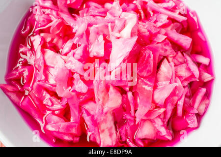 Red sauerkraut with beets in a bowl Stock Photo