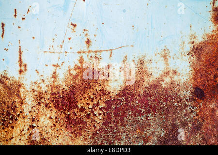 Old blue grunge metal wall with red rust, background texture Stock Photo