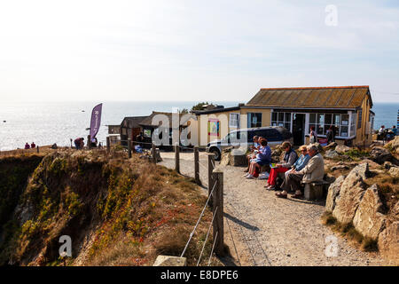 The Lizard peninsular shop shops and café cafés tourists looking out to sea Cornwall UK lowest point cafe cafes gift gifts Stock Photo