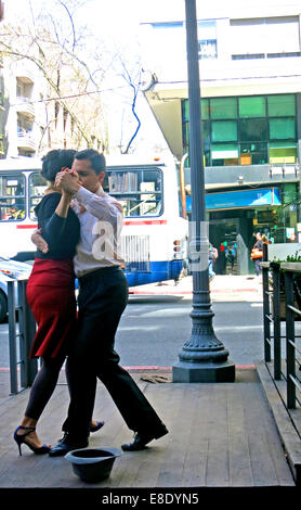 a couple dancing tango in street Montevideo Uruguay Stock Photo