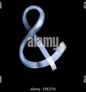 Ampersand Symbol Icon Using Light Painting Technique isolated over black Background Stock Photo