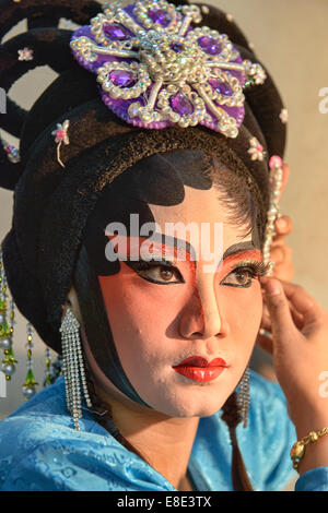 Chinese opera performer prepares for a performance at the Vegetarian Festival in Bangkok, Thailand Stock Photo