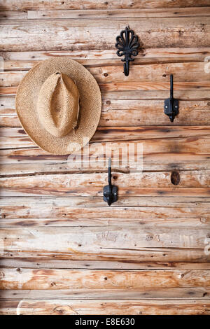 Hat Hanging on Hook Stock Photo