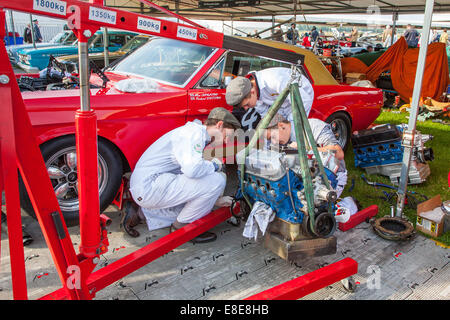 Classic vintage 1965 Ford Mustang engine change at the Goodwood Revival 2014, West Sussex, UK Stock Photo