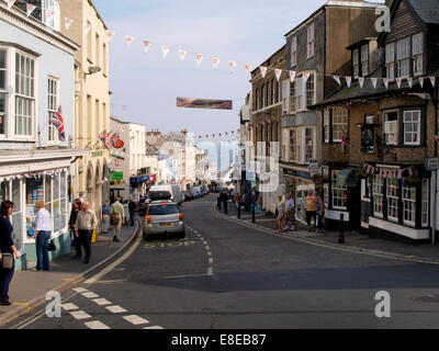 Lyme Regis high street with shops and cars, Dorset, England Stock Photo ...