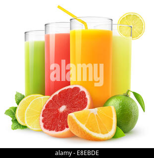 Isolated juices. Glasses of fresh juice and pile of tropical fruits  isolated on white background with clipping path Stock Photo - Alamy