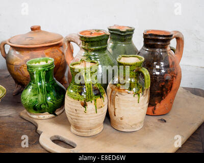 Jugs in one of the Hampton Court kitchens - England Stock Photo