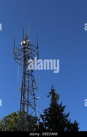 Richmond, BC Canada - September 10, 2014 : Electric high voltage pylon against blue sky in Richmond BC Canada. Stock Photo