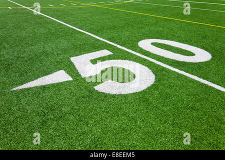 Tennessee Titans and Denver Broncos players join together in a Christmas  prayer on the 50 yard line following an NFL football game on December 25,  2004 at The Coliseum in Nashville, TN.