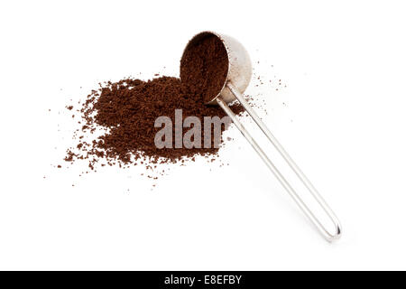 A pile of ground coffee and a spoon Stock Photo
