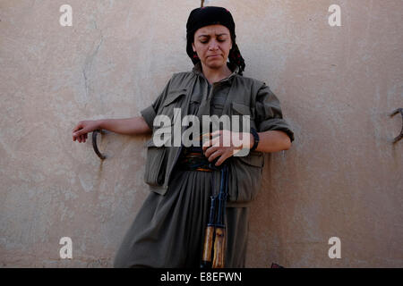 A female Kurdish fighter of the Free Women's Units shortened as YJA STAR the women's military wing of the Kurdistan Workers' Party PKK in Iraq Stock Photo