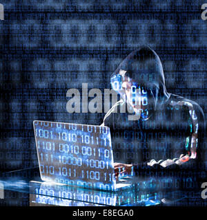 Hacker typing on a laptop with binary code in background Stock Photo