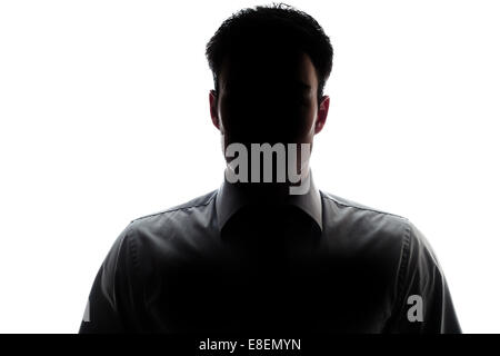 Businessman portrait silhouette and a misterious face Stock Photo