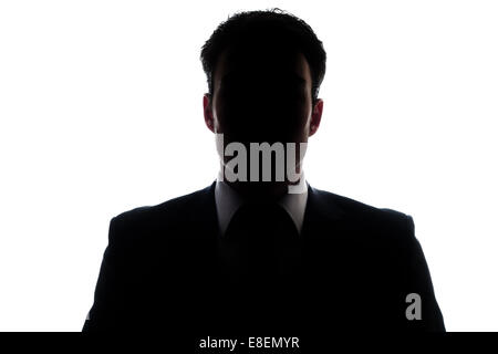 Businessman portrait silhouette and a misterious face Stock Photo