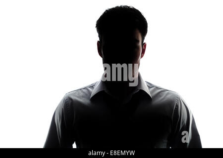 Businessman portrait silhouette and a misterious face Stock Photo