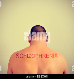 portrait of the back of a young man and the word schizophrenia Stock Photo