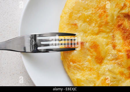 closeup of a plate with a typical tortilla de patatas, spanish omelet Stock Photo