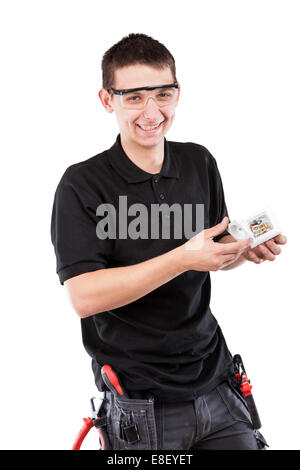 Male serviceman with electrical outlet. Stock Photo