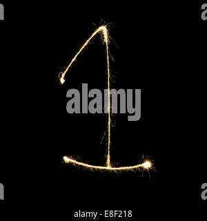 burning sparkler stick and writing sparkling text . number one  isolated on black background Stock Photo