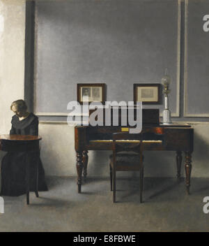 Ida in an Interior with Piano. Artist: Hammershøi, Vilhelm (1864-1916) Stock Photo