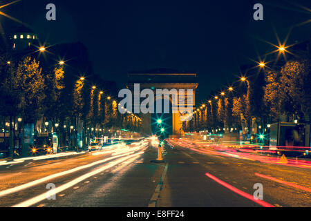 France, Paris, Avenue des Champs-Elyses at night Stock Photo