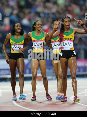 Christine Day, Novlene Williams-Mills, Anastasia Le-Roy and Stephanie McPherson (all JAM) celebrate. Jamaica Gold Medal. - Women Stock Photo