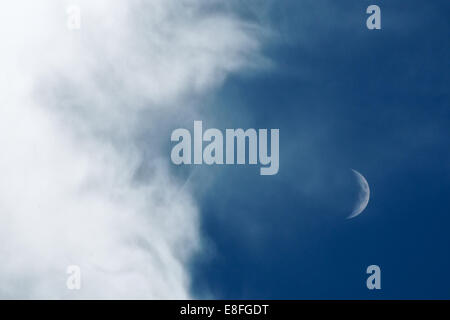 USA, Texas, Lubbock County, Lubbock, Cloudscape with moon Stock Photo