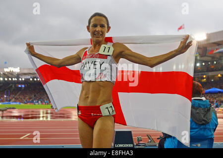 Jo Pavey (ENG) Bronze Medal celebrates with the flag- Women's 5000m Final. Athletics - Hampden Park - Glasgow - UK - 02/08/2014 Stock Photo