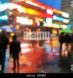 Abstract urban street scene at night, Manhattan, New York, United States Stock Photo