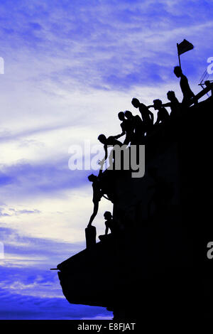 Indonesia, Jakarta Special Capital Region, Penjaringan, Maritim Raya, Teamwork in climbing up Sunda Kelapa Stock Photo