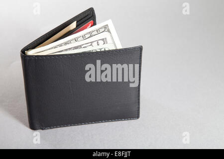 Wallet with US dollar bills Stock Photo