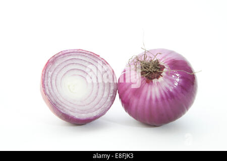 Close-up of a peeled Red Onion and half an onion Stock Photo