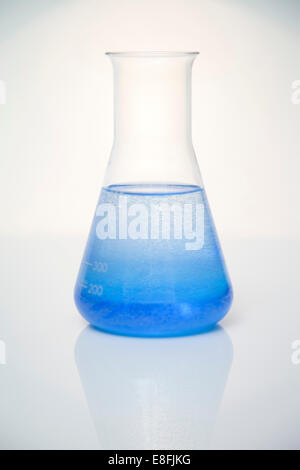 Blue liquid in conical flask Stock Photo