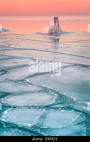 Sunset over frozen lake, Lake Michigan, Chicago, Illinois, United States Stock Photo