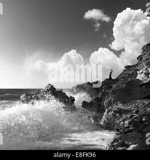 Greece, Peloponnese Periphery, Messenia Prefecture, Kyparissia, Person standing on rocks Stock Photo