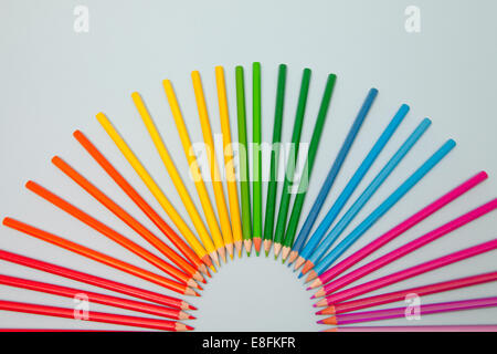 Colored Pencils arranged in semi circle Stock Photo