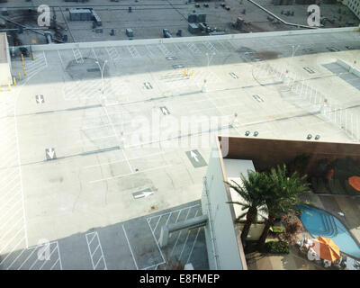 USA, Nevada, Clark County, Las Vegas, Swimming pool with car parking below Stock Photo