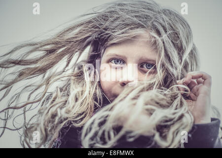 Portrait of a girl with windswept hair Stock Photo